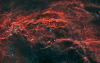 Visualization of how dark matter shapes gravitational lensing around distant galaxies.